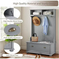 Porte-manteau d'entrée en métal gris avec banc, patères et étagères de rangement ouvertes